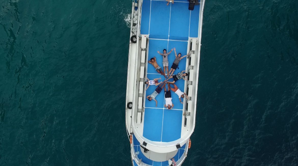 Aerial view sundeck with happy guests