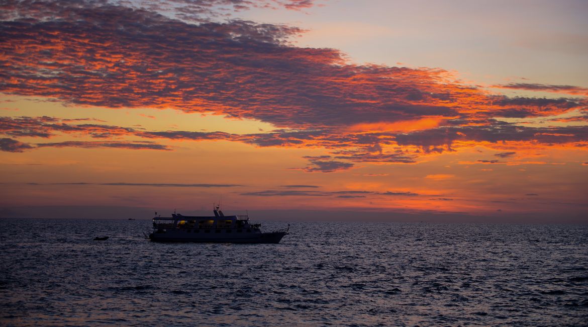 Similan liveaboard cruising at sunset