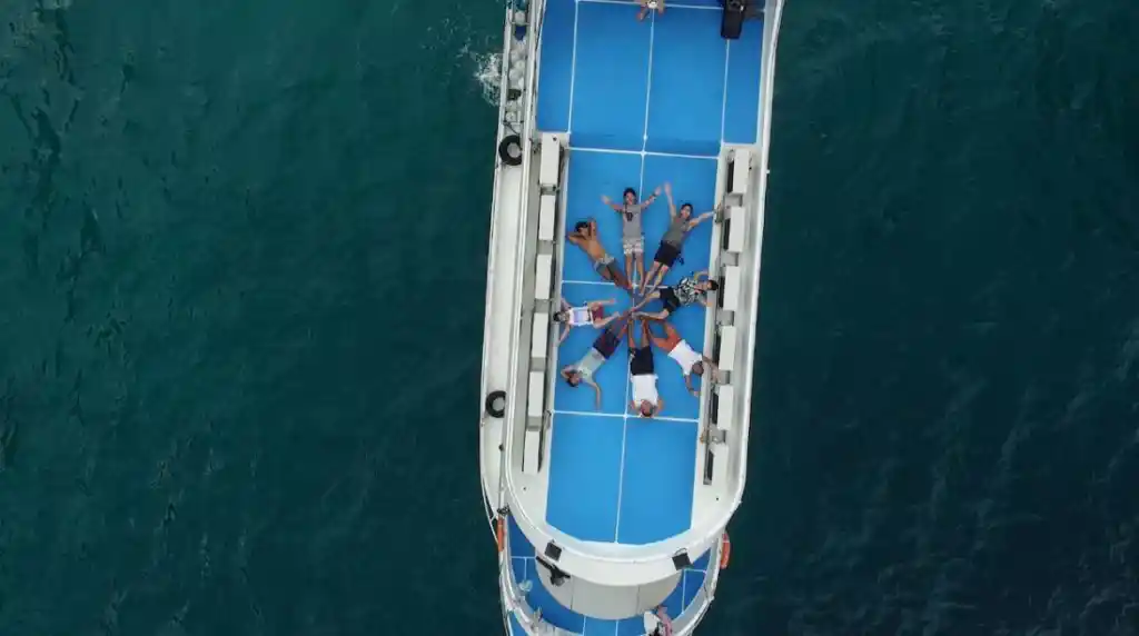 Aerial view sundeck with happy guests